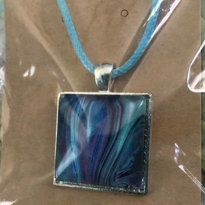 Poured paint necklace